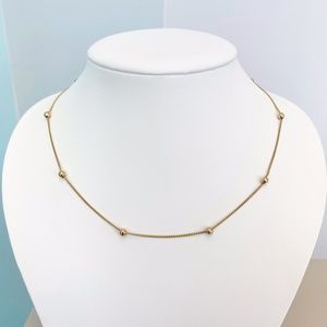 10ky curb chain with beaded accents